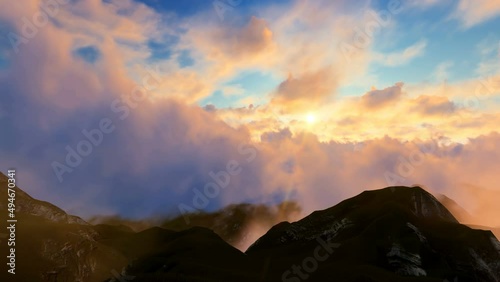 Commercial plane coming out of the clouds at sunset.