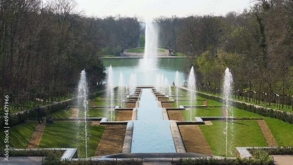 Grande Cascade in public Departemental Parc de Sceaux with Octogone Pool and Fountain in the background. Shot at early morning in March - Hauts-de-Seine, France.
