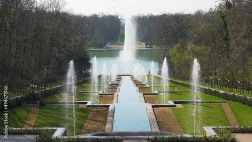 Grande Cascade in public Departemental Parc de Sceaux with Octogone Pool and Fountain in the background. Shot at early morning in March - Hauts-de-Seine, France.