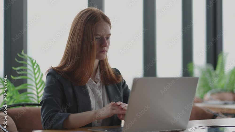 businesswoman is reading news in internet in laptop, analyzing information and planning business strategy businesswoman is reading news in internet in laptop, analyzing information and planning business strategy