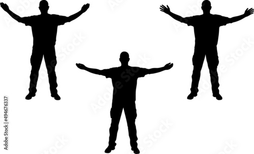 man with hands spreading wide silhouettes