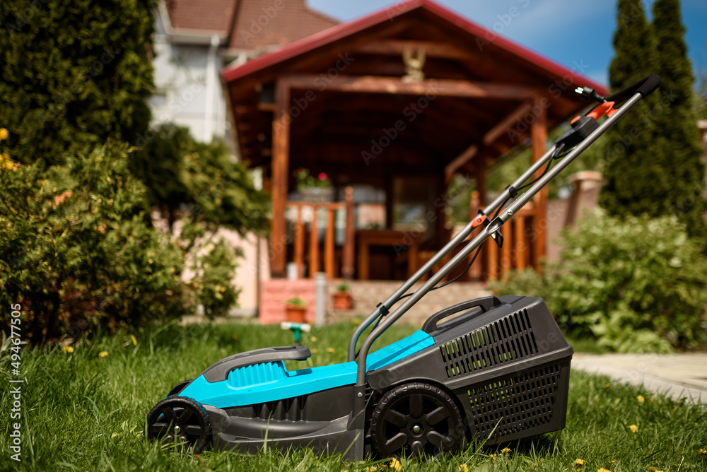 Fototapeta premium Close up of the lawn mower machine.