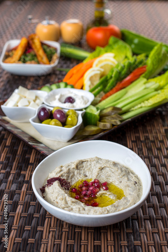 morning breakfast humus, olives, cheese and labneh with vegetables 