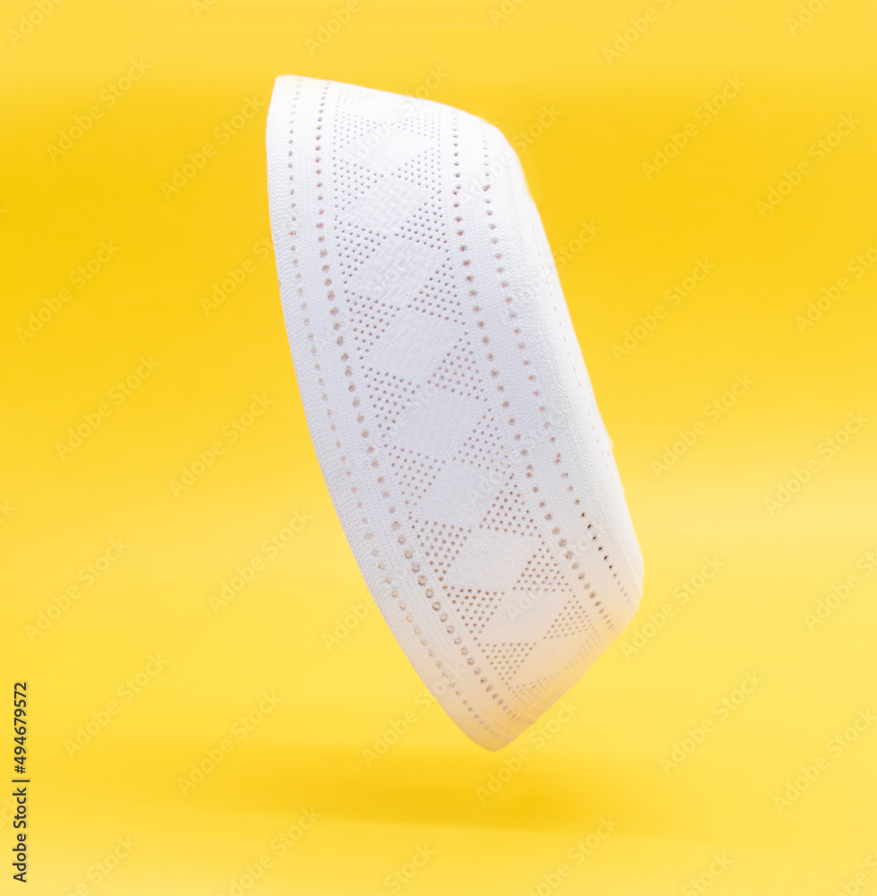 white skullcap usually worn by Muslim men, sometimes it's called as a