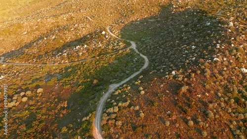 Golden Sunlight Through Kasteelpoort Hiking Trail At Table Mountain National Park In Cape Town, South Africa. Aerial Drone Shot