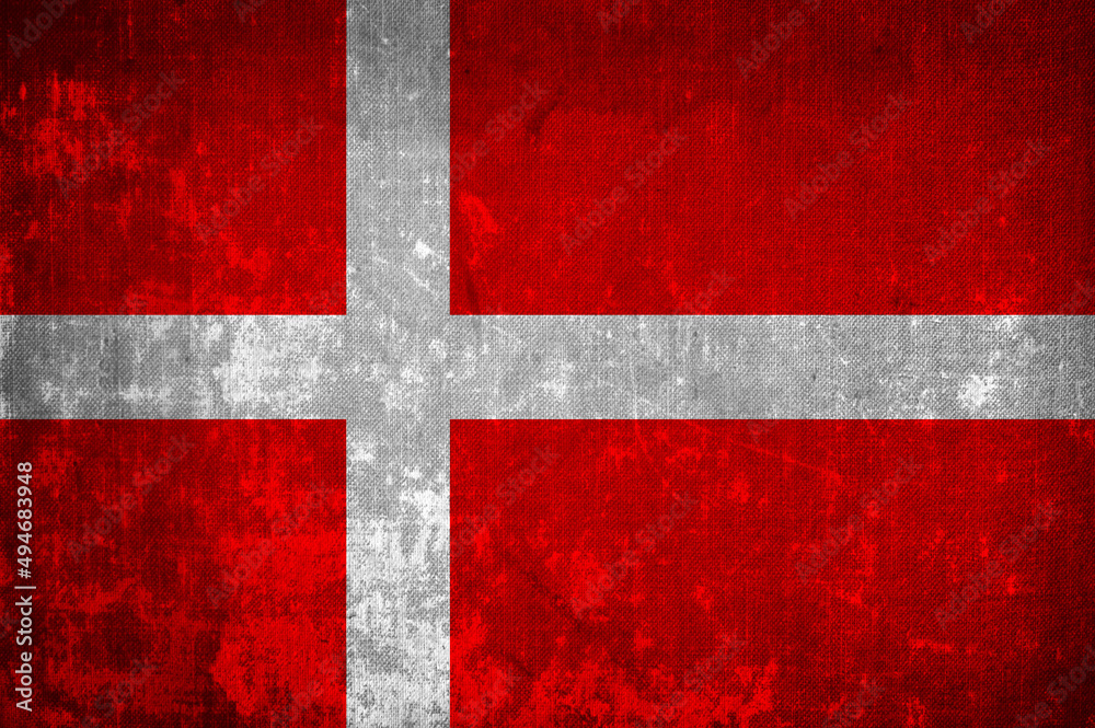Flag of Denmark on dirty old canvas surface Flag of Denmark on dirty old canvas surface