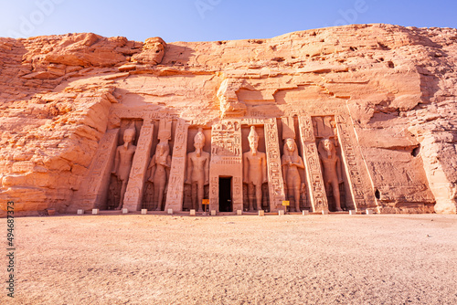 Photography Standing statue in front of The Temple of Hathor and Nefertari.