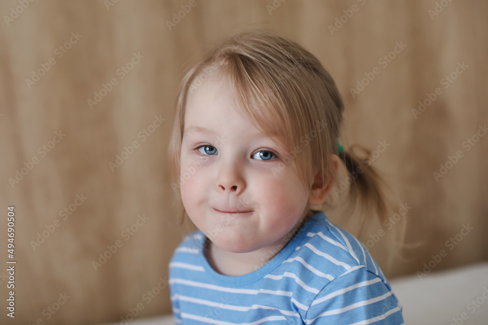 Portrait of child indoors. Happy funny toddler girl at home Portrait of child indoors. Happy funny toddler girl at home