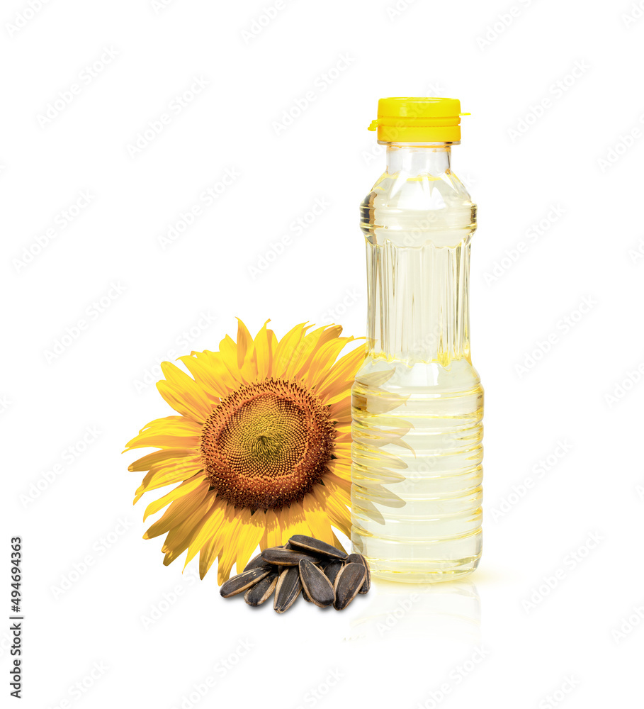 Sunflower seed oil in plastic bottle and fresh organic sun flower seeds isolated on white background. Sunflower seed oil in plastic bottle and fresh organic sun flower seeds isolated on white background.