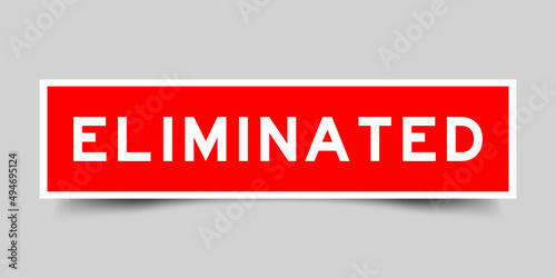 Sticker label with word eliminated in red color on gray background