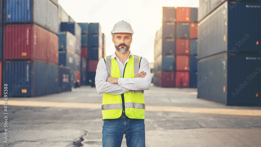 CEO or Manager in white helmet checking and control loading Containers box in warehouse , manager inspector or Safety Supervisor in Container Custom Terminal port concept import export transportation CEO or Manager in white helmet checking and control loading Containers box in warehouse , manager inspector or Safety Supervisor in Container Custom Terminal port concept import export transportation