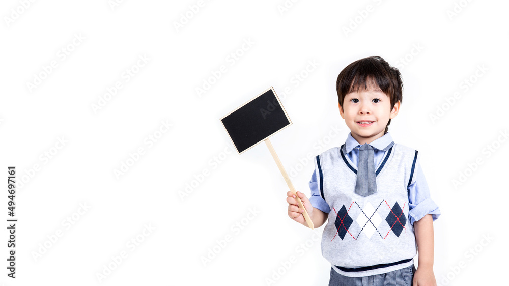 little boy holding a sign on white background. little boy holding a sign on white background.