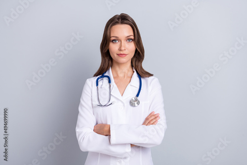 Photo of qualified lady paramedic cross arms ready stop cov pandemic isolated over grey color background