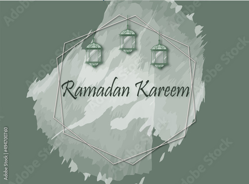 Ramadan Kareem with green watercolor background and lams photo