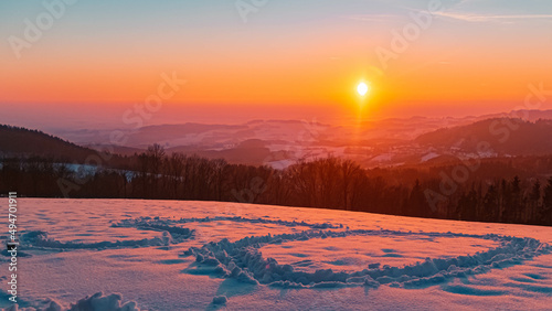Beautiful winter sunset with a number engraved into the snow at Kostenz  Bavarian forest  Bavaria  Germany