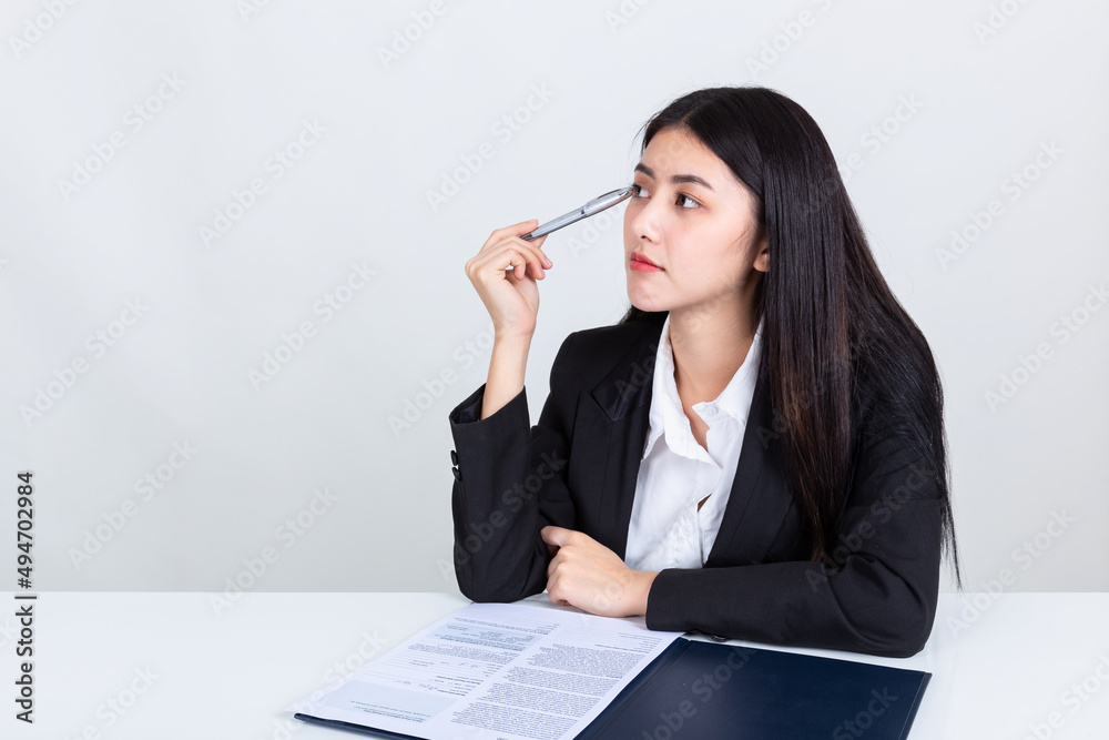asian business woman working in office with documents. asian business woman working in office with documents.