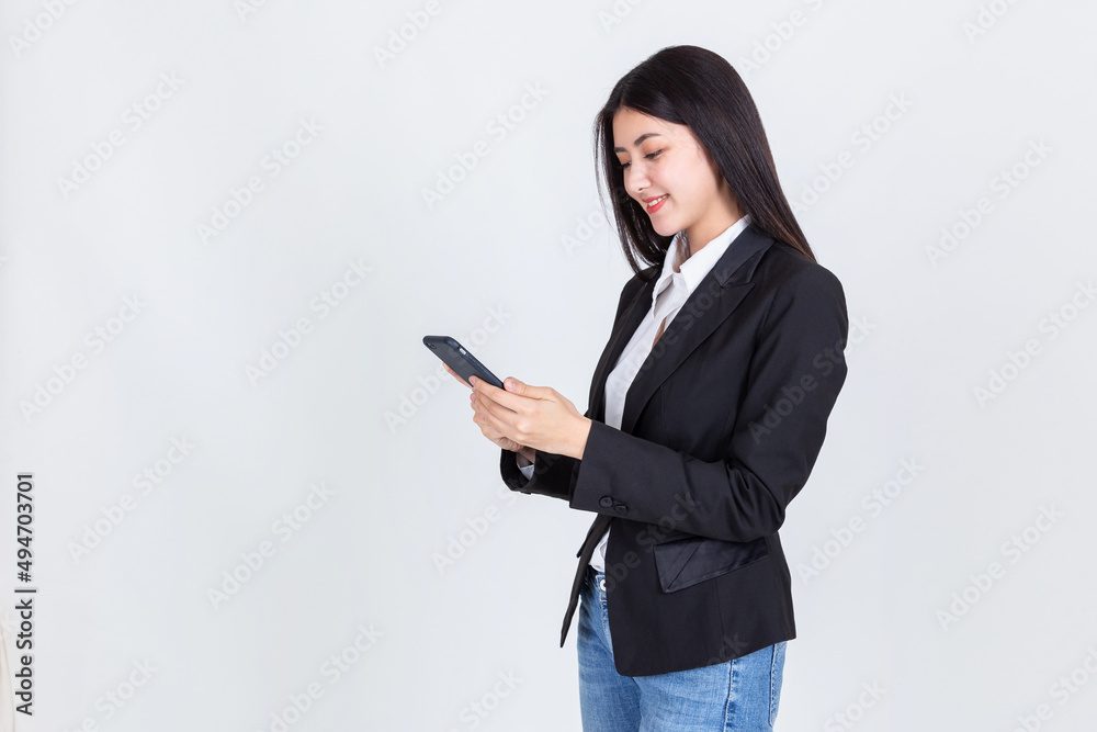 business asian woman wearing office clothing successful hold smart phone mobile and computer laptop , Technology communication lifestyles concept.