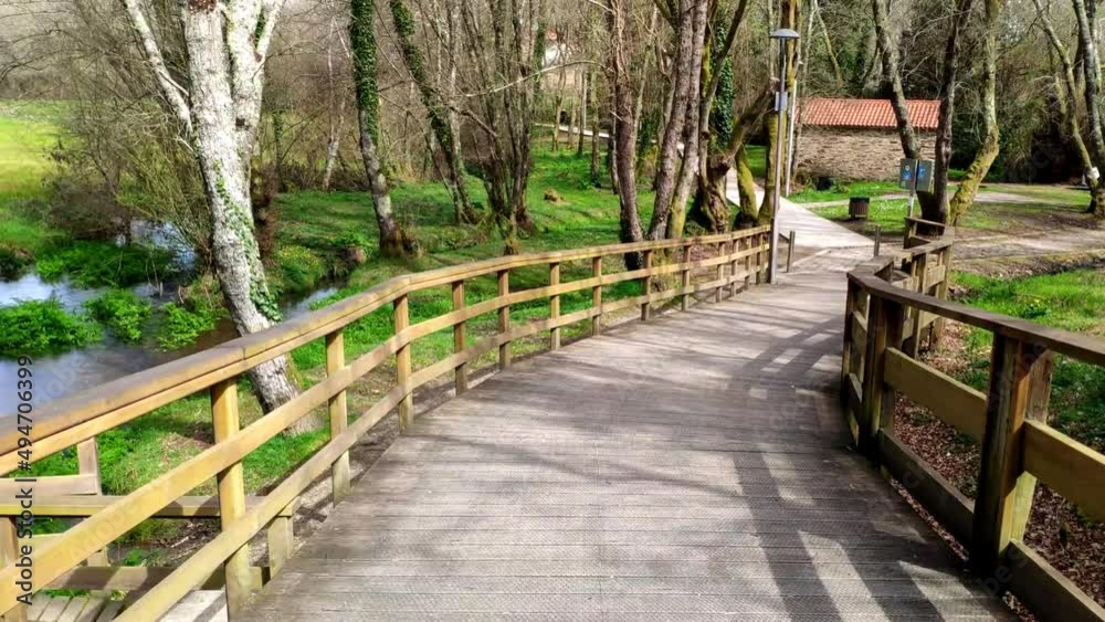 POV Walking Along Empty Elevated Wooden Promenade In Local Park At Ordes, Coruna POV Walking Along Empty Elevated Wooden Promenade In Local Park At Ordes, Coruna