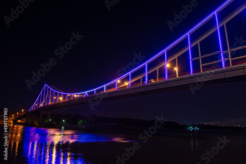 Night view of pedestrian bridge on Dnipro in Kiev Ukraine © Serhii