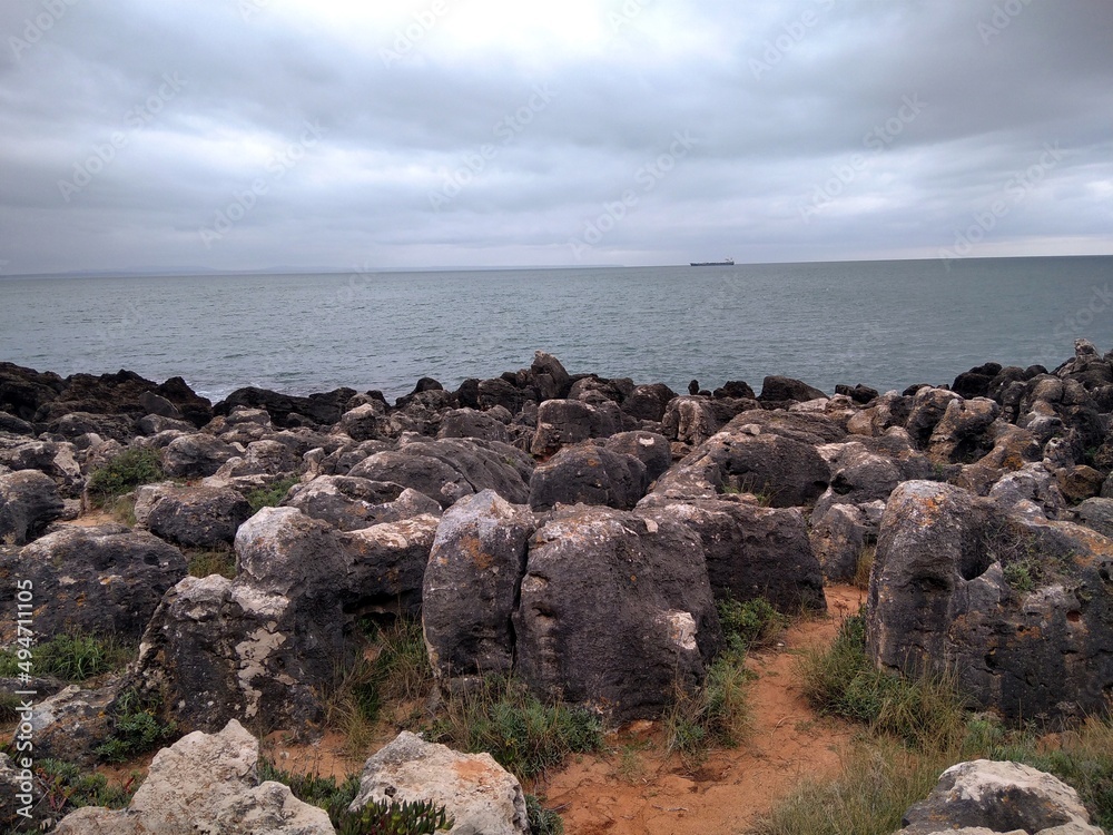 Cascais. Portugal.  Stones on the ocean.