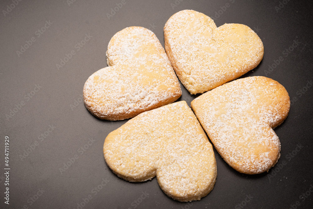 Shortbread in the shape of a heart isolated on white background. Shortbread in the shape of a heart isolated on white background.