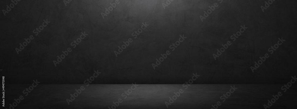 Dark grey cement wall room empty studio backdrop and rough floor with soft light well editing displays products and text present on free space concrete background