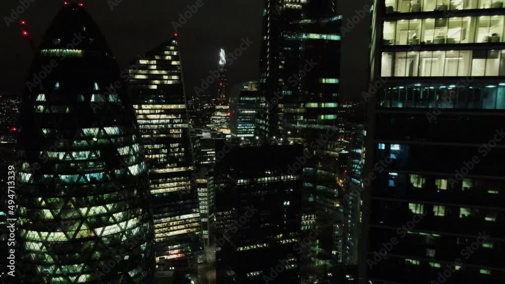 Gherkin, sky garden and the shard on a drone shot at night Gherkin, sky garden and the shard on a drone shot at night