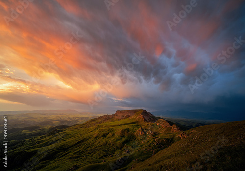 Mammatus clouds over the Bermamyt plateau. Caucasus. Dawn on the valley. Beautiful landscape.