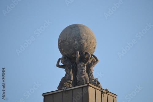 sculpture women carrying the world on their shoulders in Kyiv