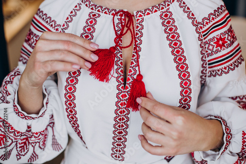 Young ukrainian woman in traditional vyshyvanka photo