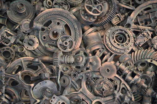 steampunk scrap metal for recycling background. a lot of different rusty industrial part detail for melt and reused