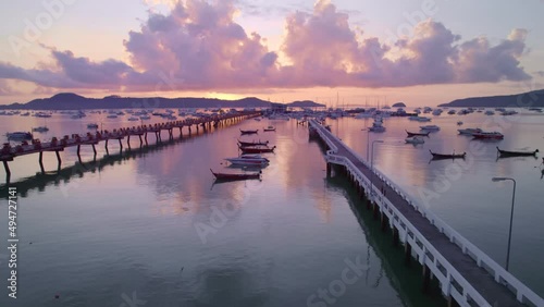 Wallpaper Mural Phuket sea sunrise sky. Aerial view of chalong bay with many boats yachts,longtail fishing boats,sailing boats in Phuket Thailand. Travel and transportation industrial concept Torontodigital.ca