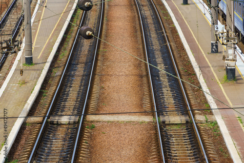 railway station infrastructure - rails and platform without people