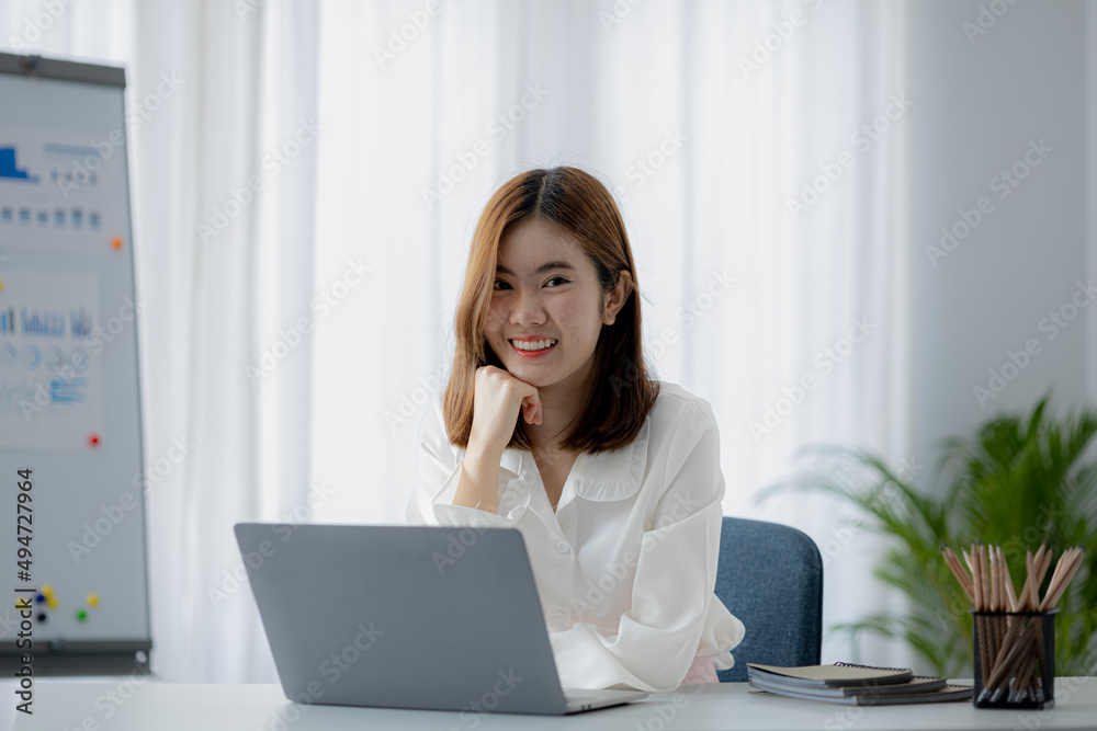 Beautiful Asian woman is a businesswoman who leads a new generation of startups, a woman who runs and manages a business plan to build confidence and stability in business, woman-led business concept. Beautiful Asian woman is a businesswoman who leads a new generation of startups, a woman who runs and manages a business plan to build confidence and stability in business, woman-led business concept.