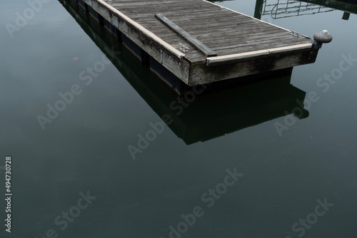 Dock on calm water in the harbor baltimore © rbecklund