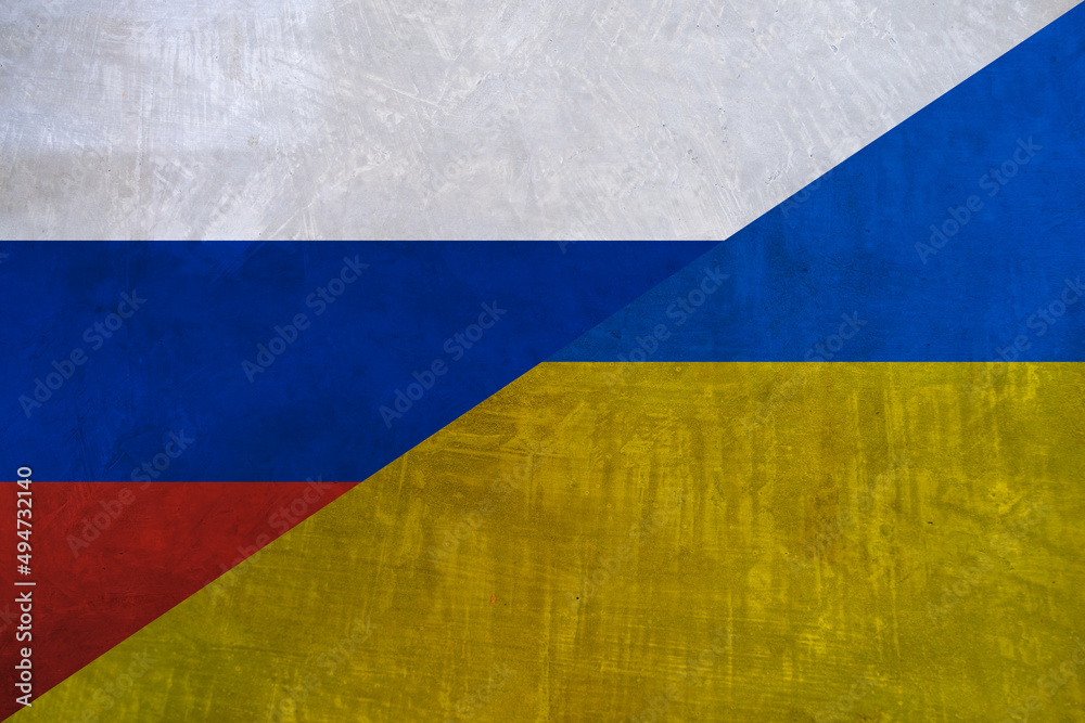 Flag of Russia and Ukraine on a grunge concrete wall. War between Ukraine and Russia background