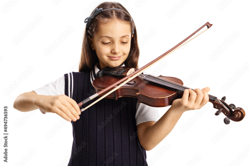 Girl in a school uniform playing a violin Girl in a school uniform playing a violin