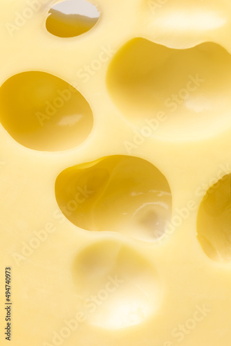 Maasdam cheese close-up.