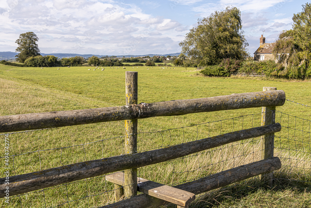 A stile on a public footpath on the flat Severn Vale beside the River Severn at Blue Boys Farm, Rodley, Gloucestershire, England UK A stile on a public footpath on the flat Severn Vale beside the River Severn at Blue Boys Farm, Rodley, Gloucestershire, England UK