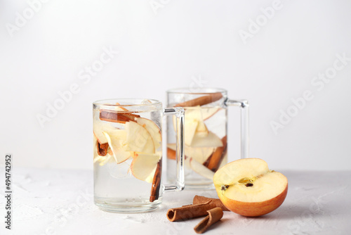 A drink made of apples and cinnamon. Detox drink. drink in glass glasses. A healthy drink.