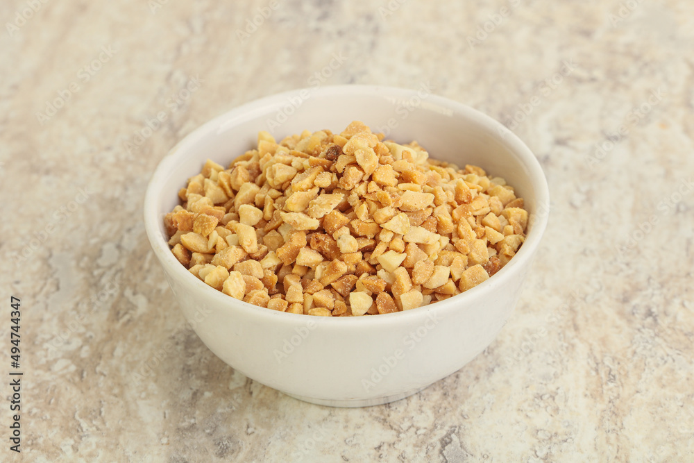 Crunched roasted peanut in the bowl Crunched roasted peanut in the bowl