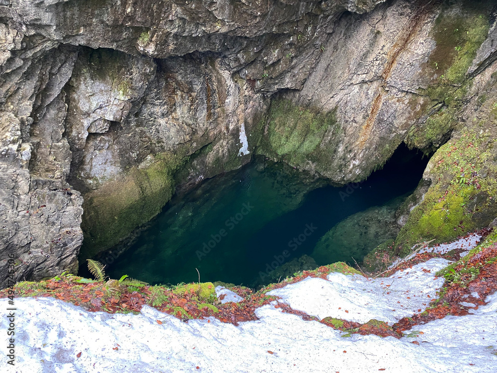 The cave and the source Hundsloch (Hundslochquelle or Hundlochquelle) by the alpine Lake Wagitalersee (Waegitalersee or Wägitalersee), Innerthal - Canton of Schwyz, Switzerland (Kanton Schwyz, Schweiz