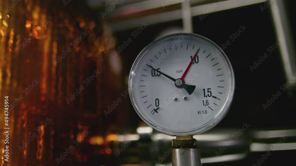 Close up Pressure gauge inside of an alcohol drink factory . Tachometer