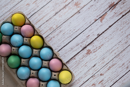 Easter eggs in egg carton for easter hunt. Copy Space. 