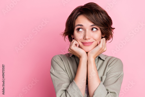 Portrait of minded nice glad lady touch hands chin imagine gifts isolated over pastel color background