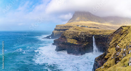 Trøllkonufingur, Vágar, Faroe Islands - Trøllkonufingur, which means the Troll woman’s finger, is a 313 m tall monolith on the south-east side of Sandavágur on the island of Vágar.