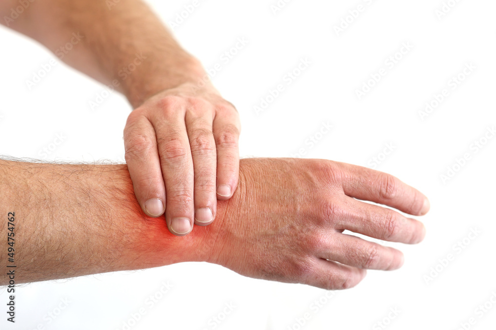 Caucasian man holding the wrist pain because using wrist in one position too long. De Quervain's tenosynovitis, Intersection Symptom, Carpal Tunnel Syndrome or Office syndrome concept. Caucasian man holding the wrist pain because using wrist in one position too long. De Quervain's tenosynovitis, Intersection Symptom, Carpal Tunnel Syndrome or Office syndrome concept.