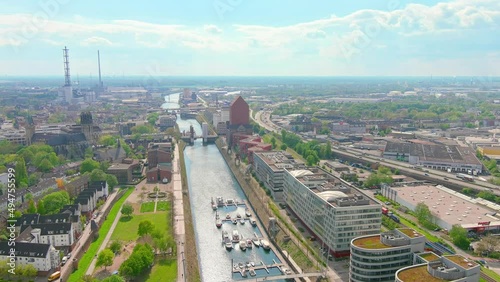 Duisburg: Aerial view of industrial city in Germany with world's largest inland port, Duisburg Inner Harbour (Innenhafen Duisburg) - landscape panorama of Europe from above - HDR photo