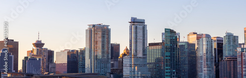 Panoramic View of Modern City Building Skyline. Sunny Winter Sunrise. Coal Harbour, Downtown Vancouver, British Columbia, Canada. Cityscape Panorama Background