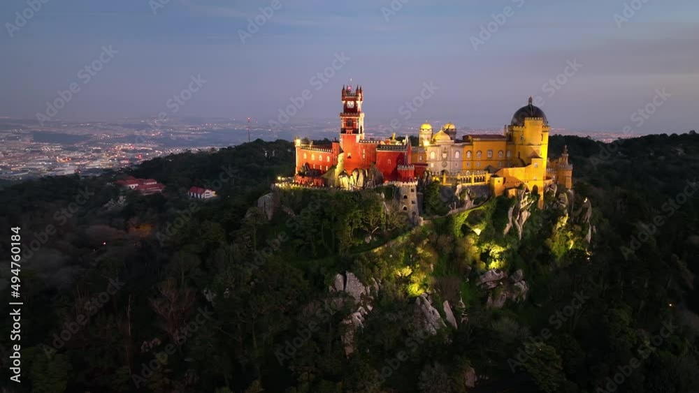 Aerial view of stunning Pena Castle at night. Top view of illuminated Sintra Aerial view of stunning Pena Castle at night. Top view of illuminated Sintra